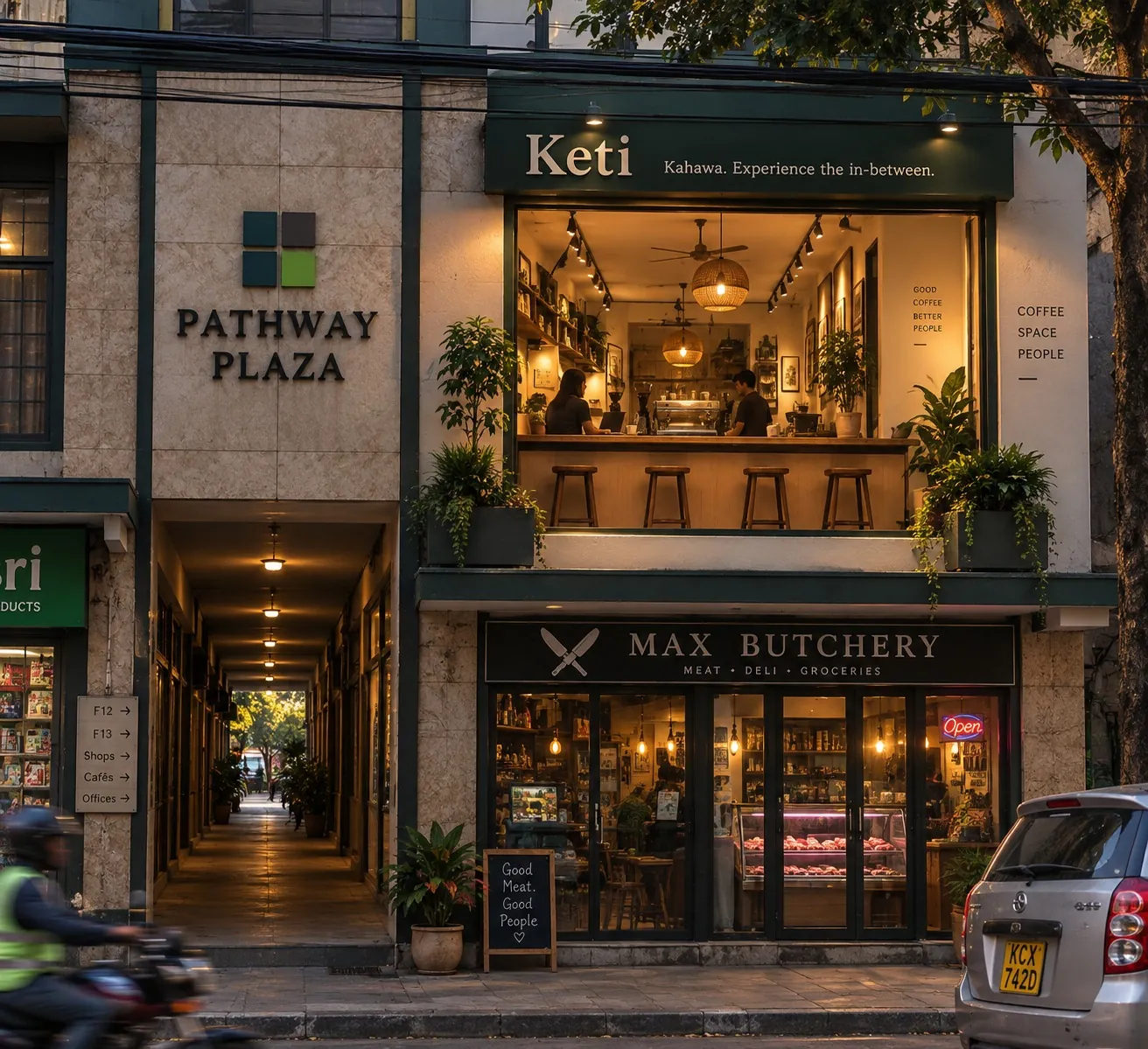 Keti concept: Pathway Plaza at dusk with Keti glowing on the first floor